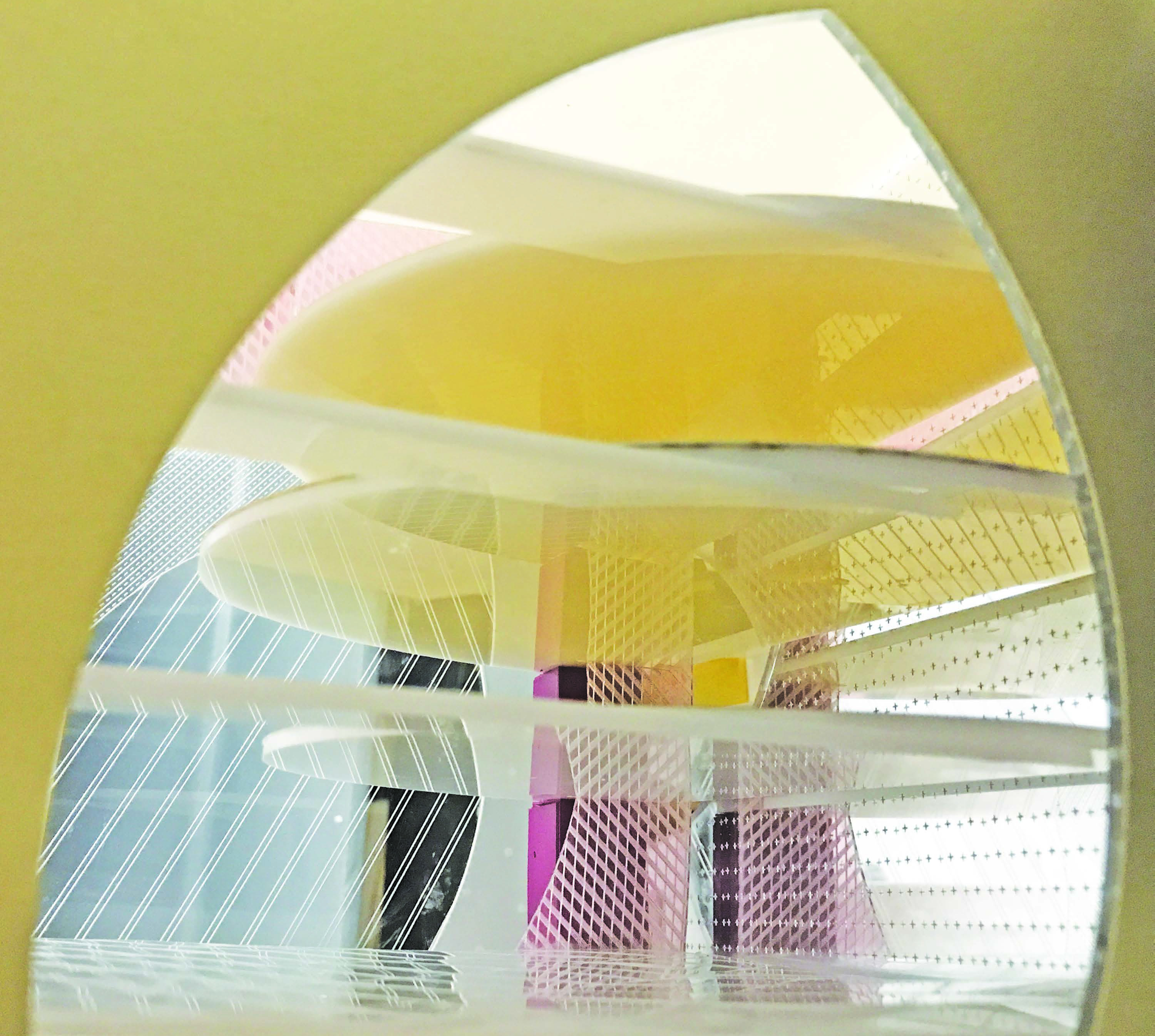 Interior model view through oval aperture — layered acrylic and gold